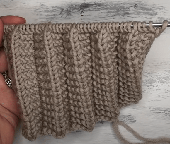 Close-up of the pleated knitting pattern