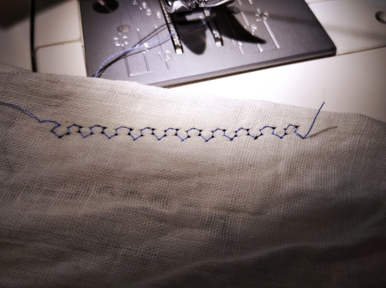 Overlock stitch sample on light fabric