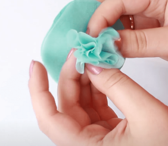 Paper layers separated and shaped into a flower