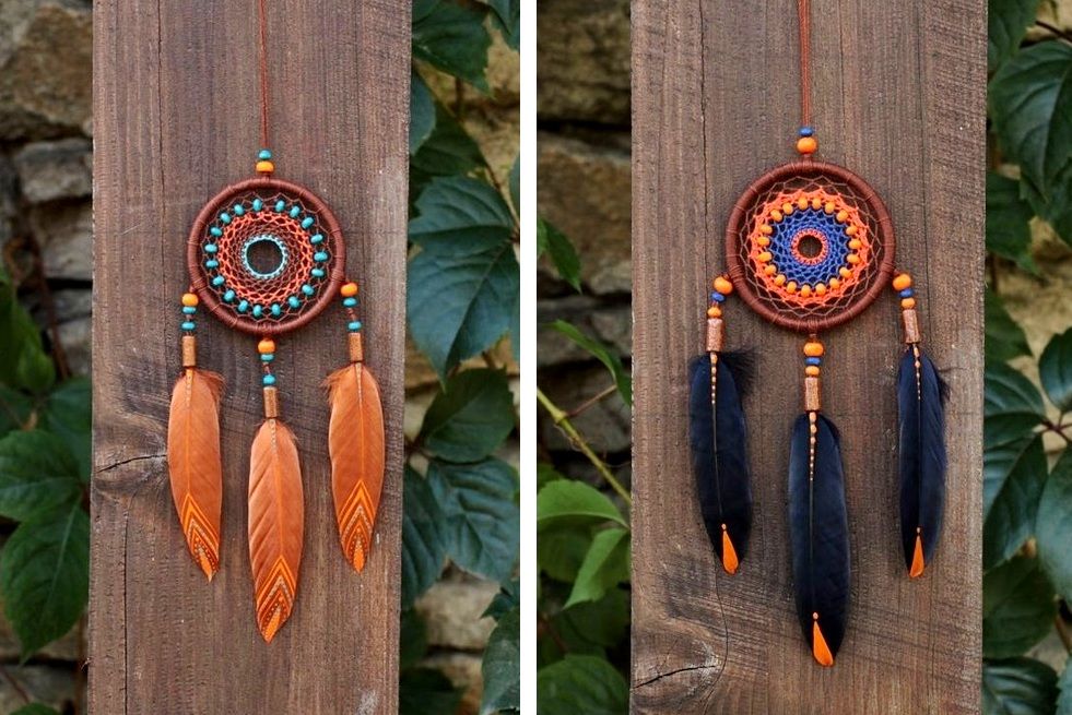 Dreamcatcher decorated with painted feathers