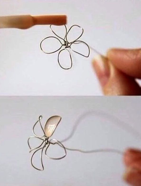 Wire frame holding a nail-polish film that forms a flower petal