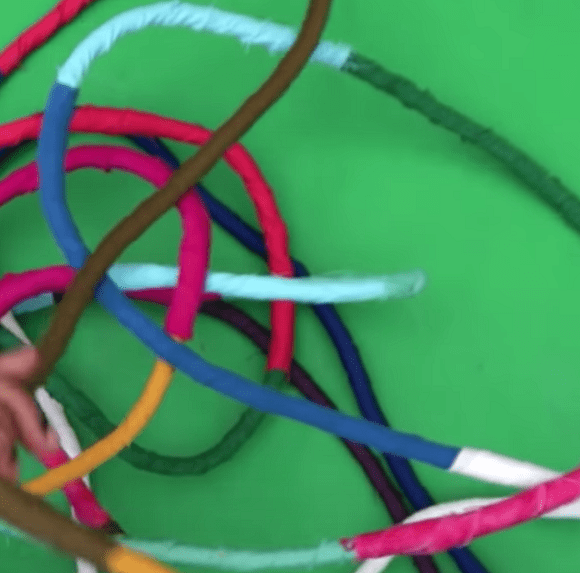 Lengths of rope wrapped in colourful fabric strips