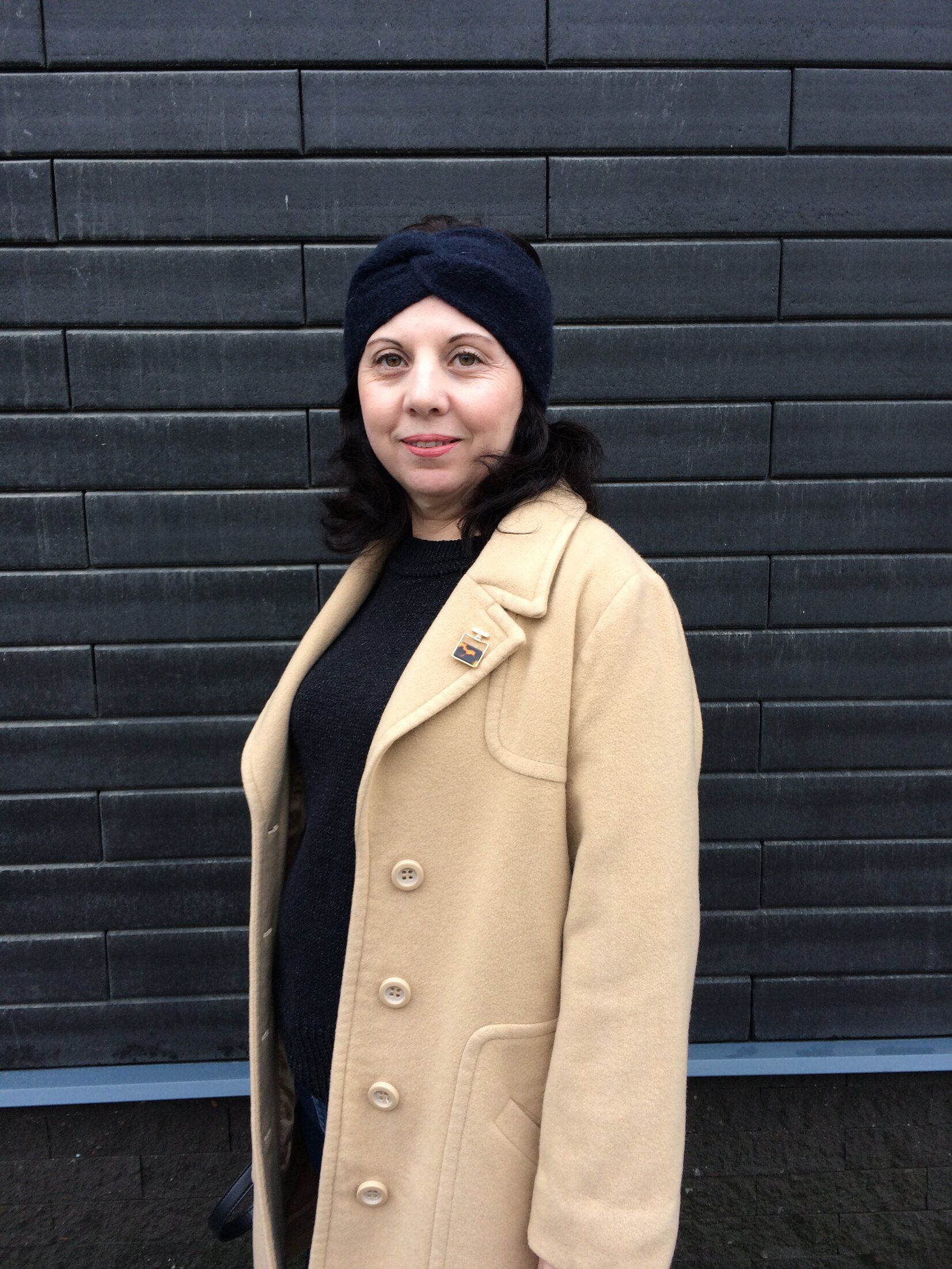 Black knitted turban headband, side view