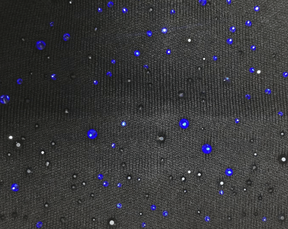 Rhinestone design covered with fabric before heat application
