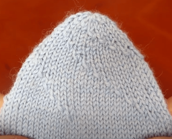 A light-colored sock with a spiral toe