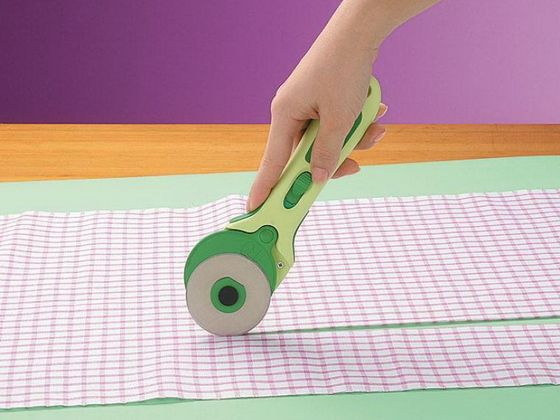 Using a rotary cutter while standing