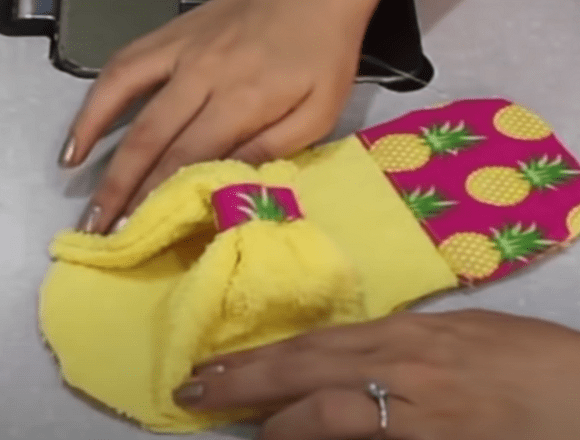 Gathered slipper upper attached to the sole