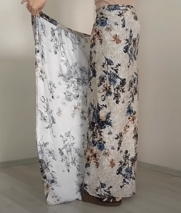Finished summer skirt-pants with a floral print worn on a model