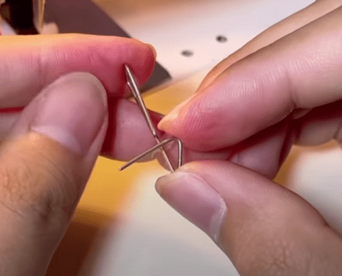 Bending the paperclip into a loop