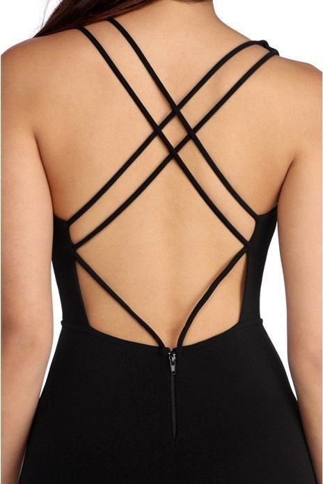 Back view of a blouse with decorative cutout detail