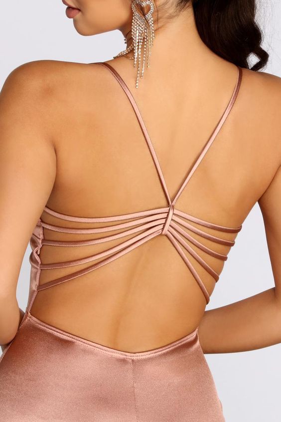 Blouse showing a low-cut back with subtle shaping