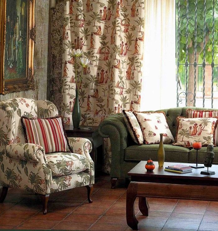 Upholstered chair covered in tapestry fabric