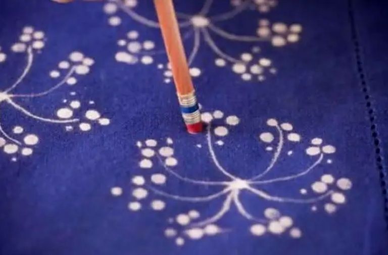 Finished botanical pattern on denim