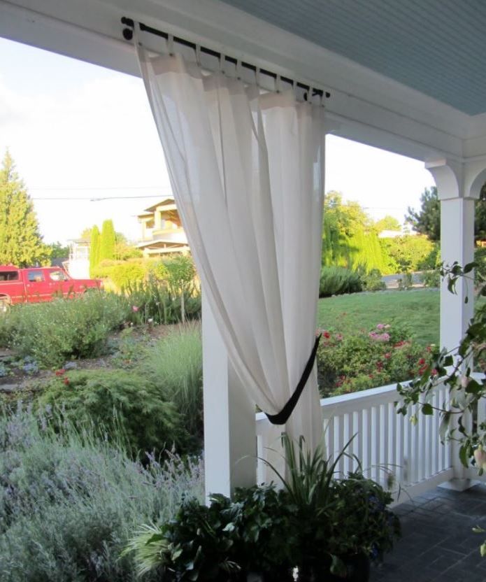 Outdoor gazebo with curtains