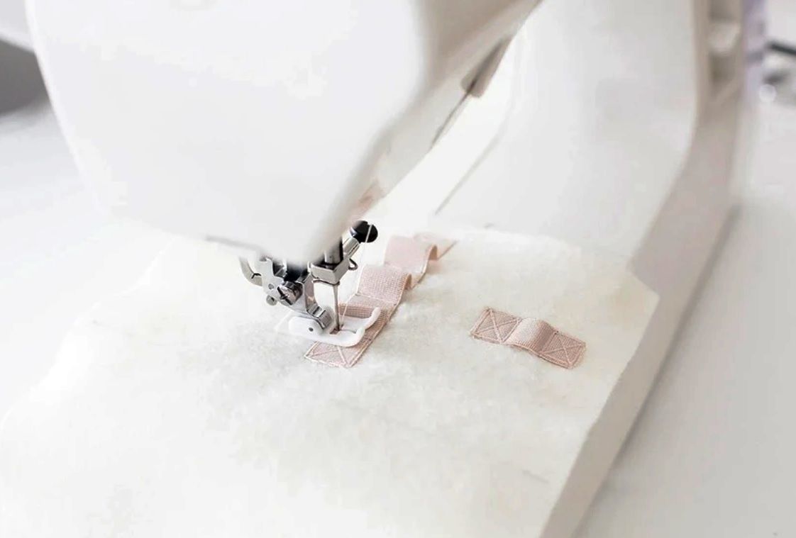 Sewing elastic loops to the felt piece of the case