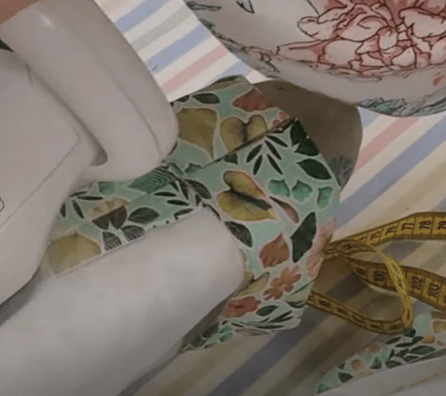 Pressing the hem of a pant leg with a vent