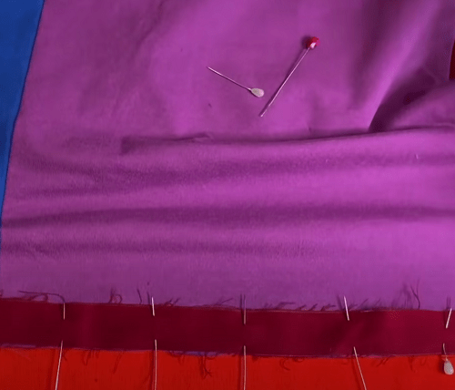Quilting along a marked line on the blanket