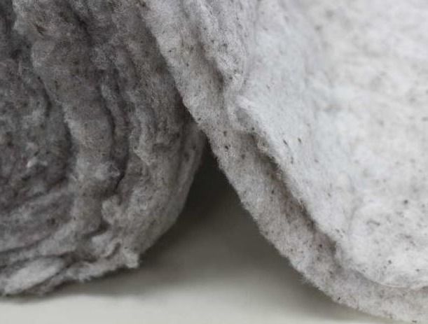 Rolls of gray wool-blend nonwoven insulation