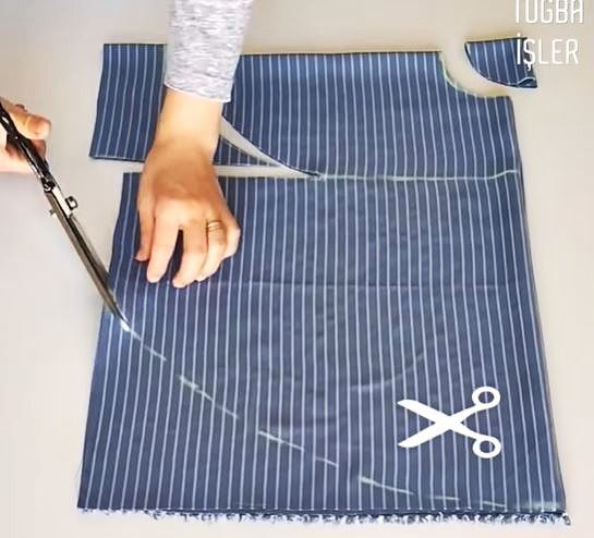 Cutting the sleeve and side line in dress fabric