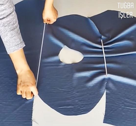 Opened dress piece with elastic along the bodice line