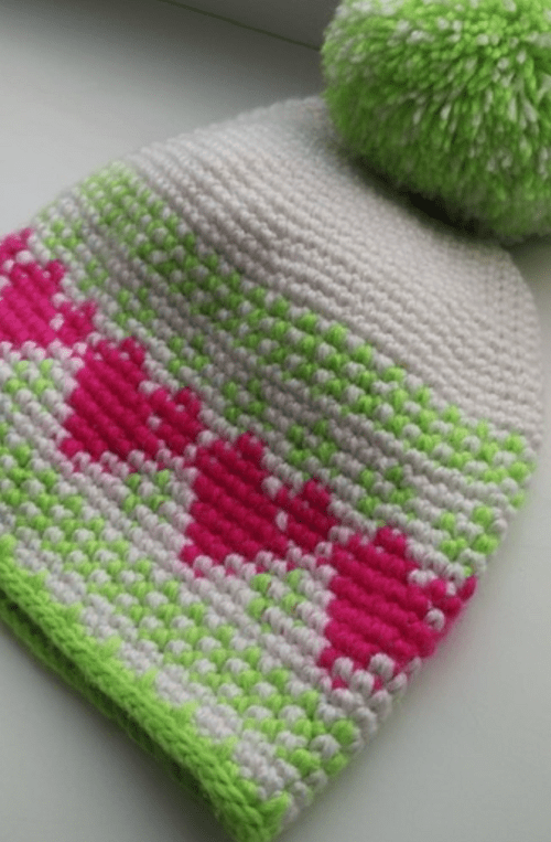 A hat with a mosaic floral crochet pattern