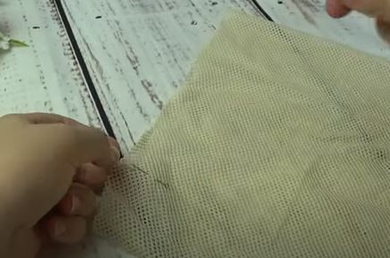 Tulle fabric folded for cutting a reusable produce bag