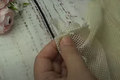 Forming the casing on a mesh bag blank