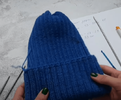 The finished upper section of a helmet hat after closing the crown