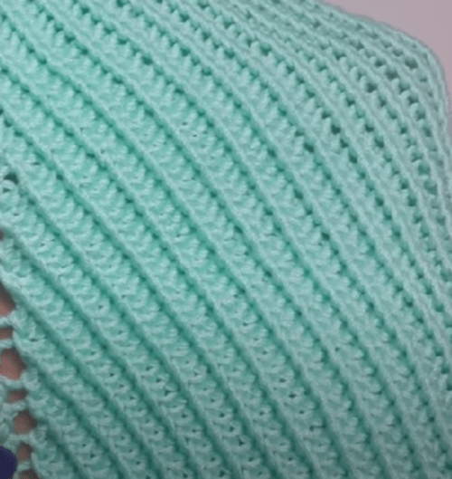 Close-up of a blue twisted-rib swatch