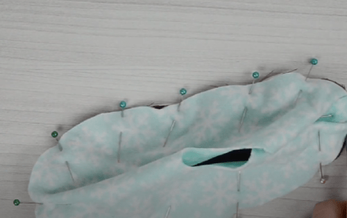 Basted slipper upper with pins along the edge