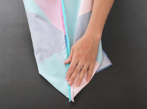 Folding a tote corner to form the boxed bottom