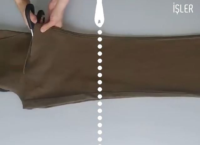 Cutting off the top of the trousers for the skirt yoke