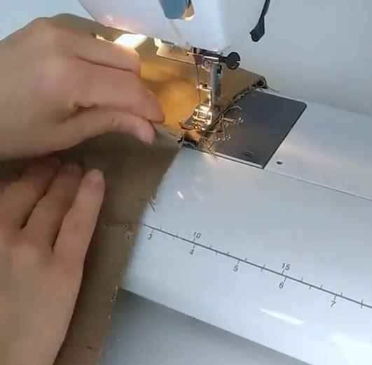 Sewing fabric strips and securing inverted pleats on a sewing machine