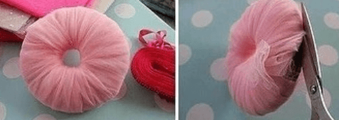 Pink tulle cut between cardboard rings and tied at the centre