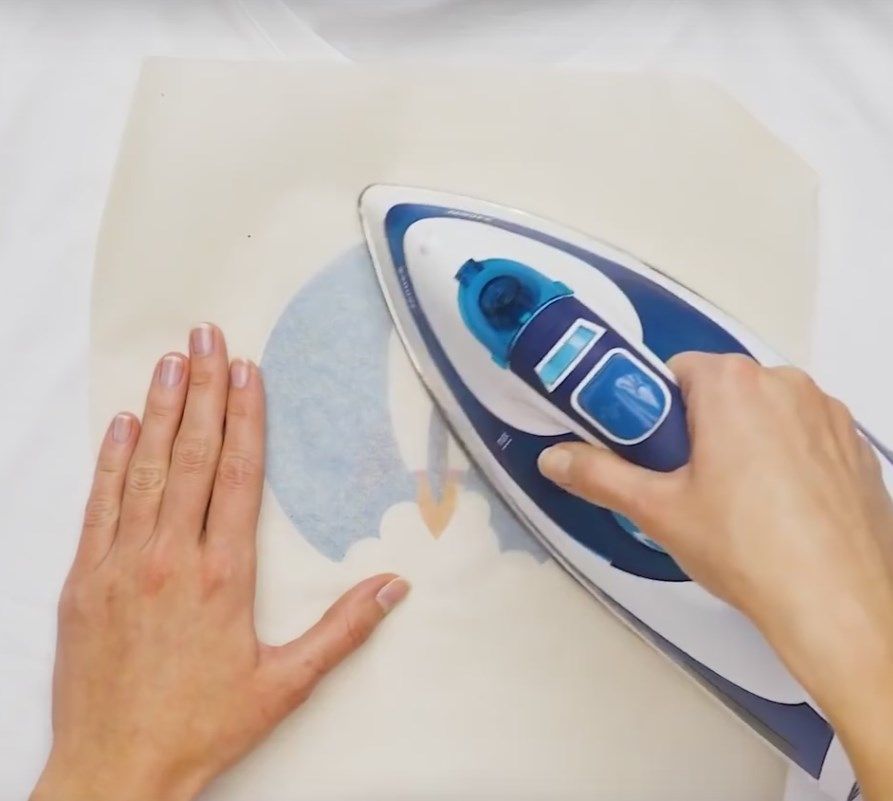 Using parchment paper while ironing