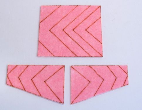 Pattern for a decorative swimsuit patch on pink felt