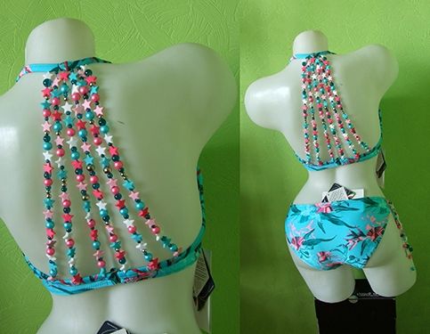 Blue swimsuit with long beaded back decoration