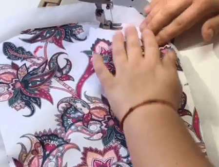 Stitching shell fabric to polyester batting close to the edge
