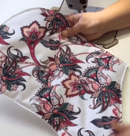 Finished shell-fabric piece with evenly attached polyester batting