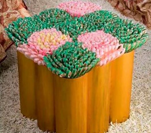 An ottoman made from plastic pipe scraps