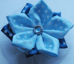 Finished fabric flower with a button center