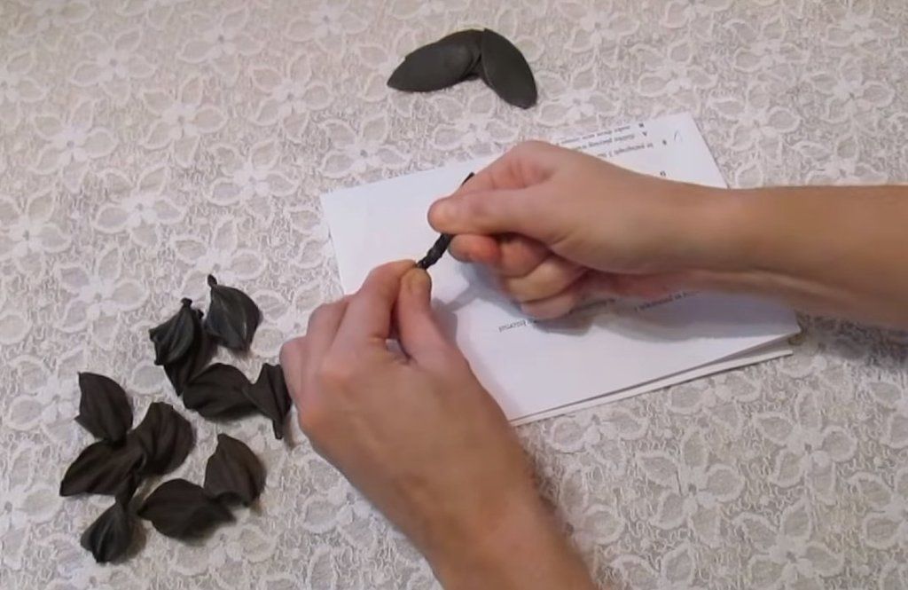 Shaping a curved petal for a leather flower