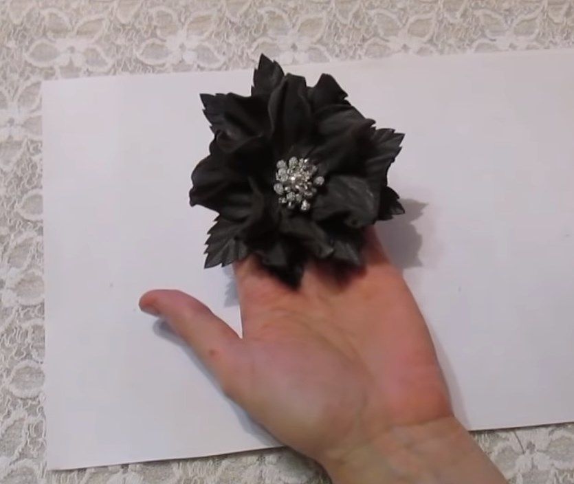 Finished leather flower with glue stiffener