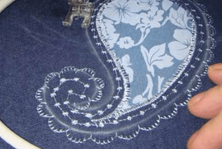 Appliqué with several rows of decorative stitches