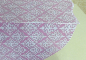 Box covered in pink ornament paper