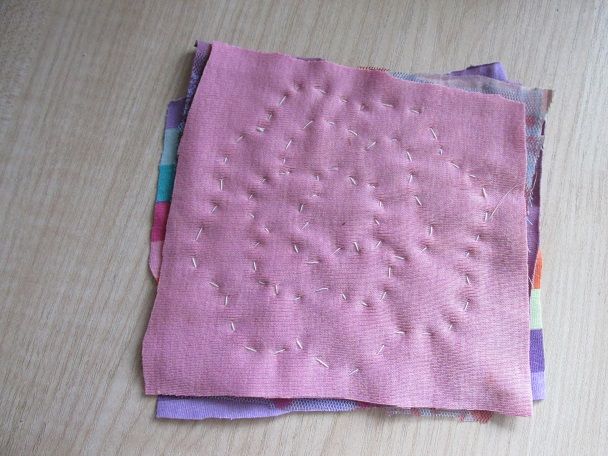 Drawing the rose outline on the fabric layers