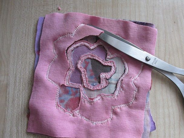 Trimming the fabric layers to create volume