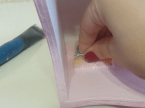 Gluing a decorative overlay inside the box