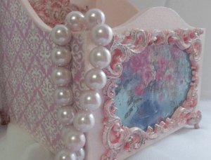 Decorated spice box in pink rococo style