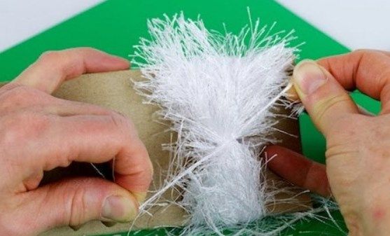 Tying the wrapped yarn for the elf's beard
